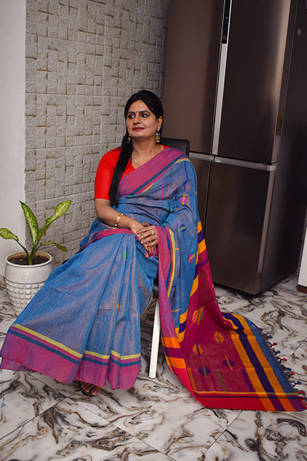 Blue Handloom Tissue Linen Saree With Red Border