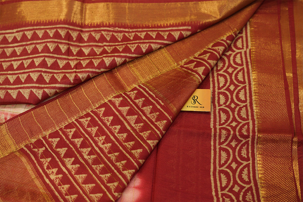 Batik print white and red maheshwari cotton saree with golden zari border