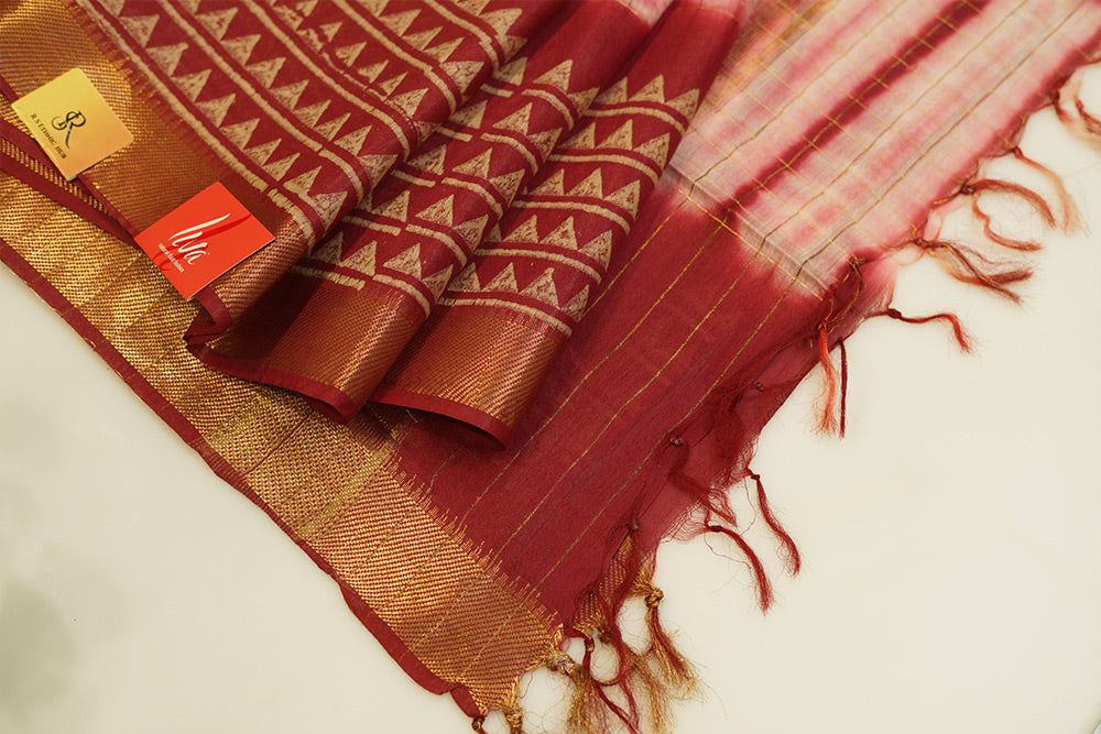 Batik print white and red maheshwari cotton saree with golden zari border