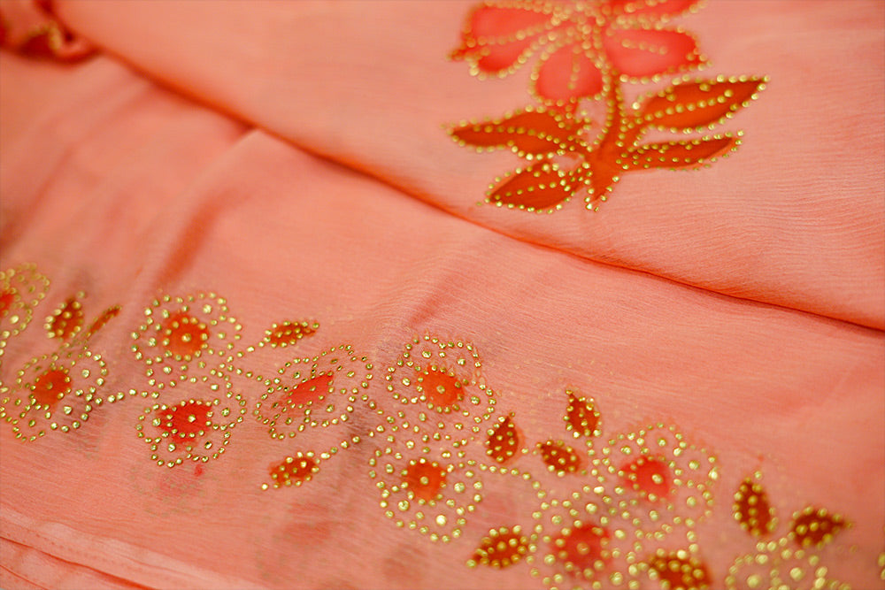 Light Orange chiffon (Peach) saree with hand paint and golden buttis work all over