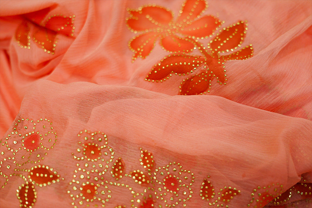 Light Orange chiffon (Peach) saree with hand paint and golden buttis work all over