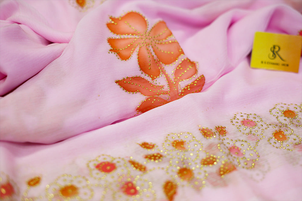 Light Pink chiffon saree with hand paint and golden buttis work all over