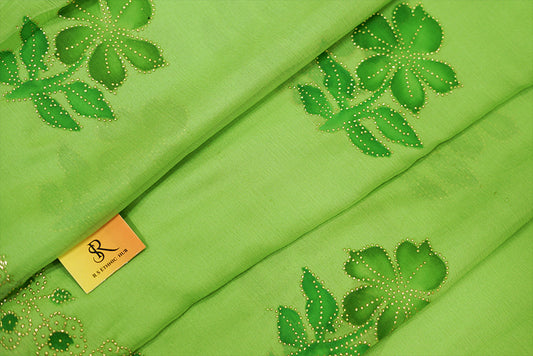 Green chiffon saree with hand paint and golden buttis work all over