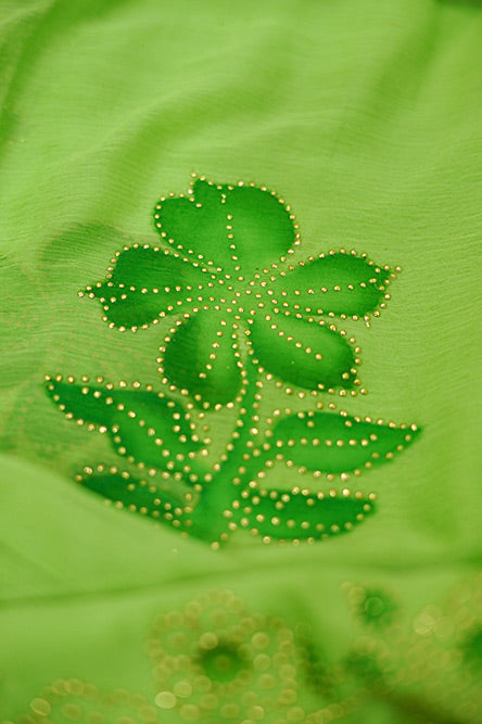 Green chiffon saree with hand paint and golden buttis work all over