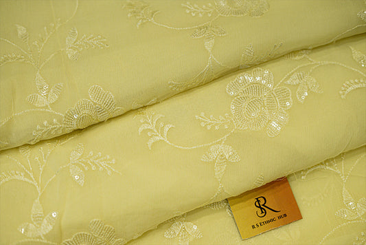 Light yellow chiffon saree with full embroidery and sequence work