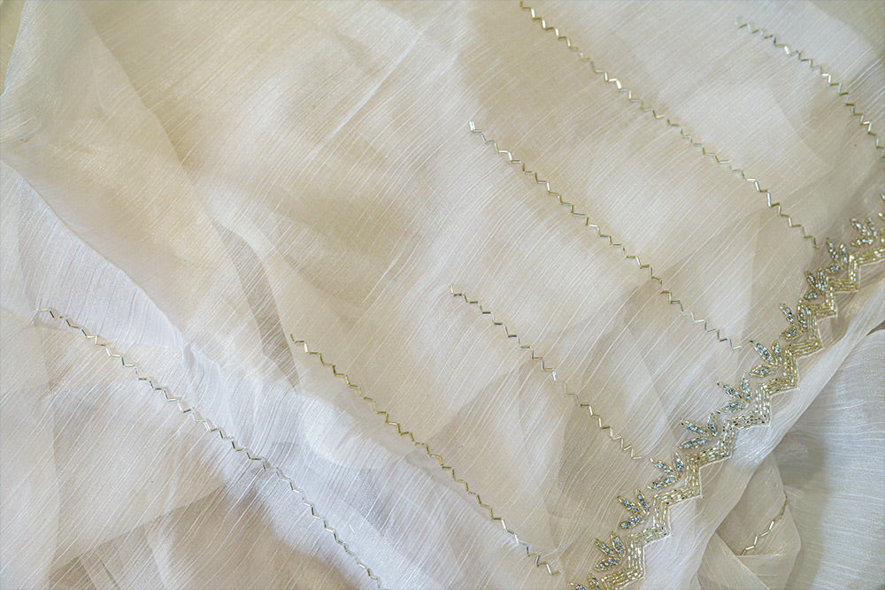 White jimmy choo fabric with embroidered border and stripes embroidery