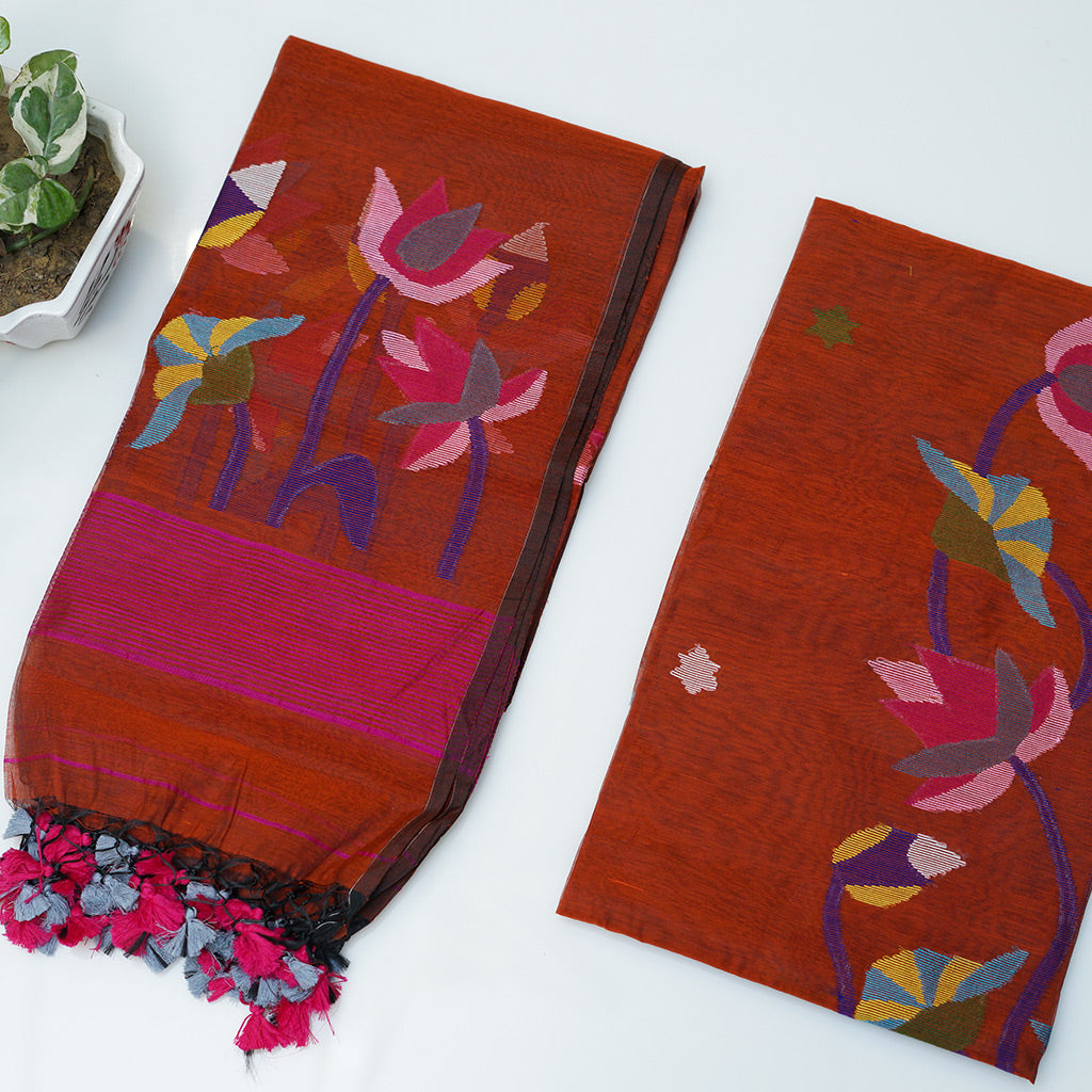JAMDANI cotton jamdani suit in rust colour with pink blue embroidery and tassels